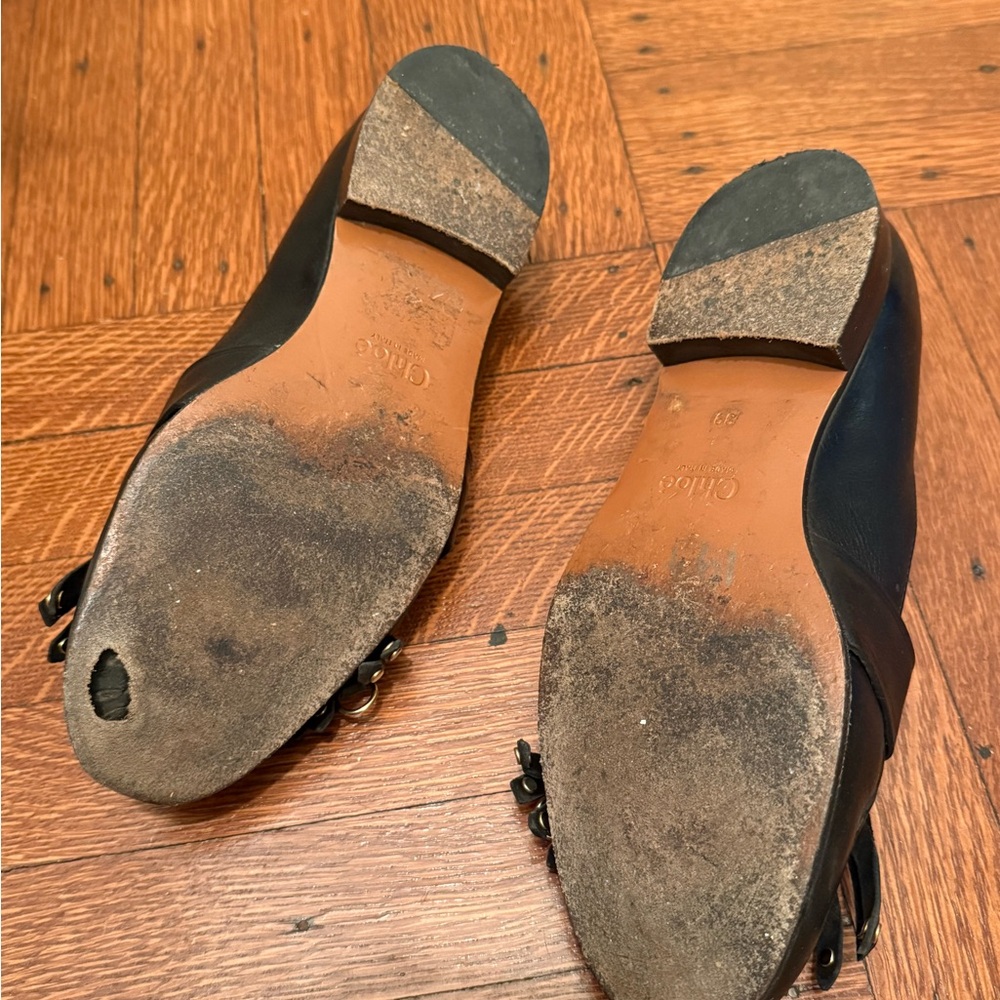 Black Leather Loafers with Gold Accents - Picture 2 of 4